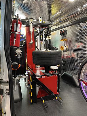 Tire changer inside the van