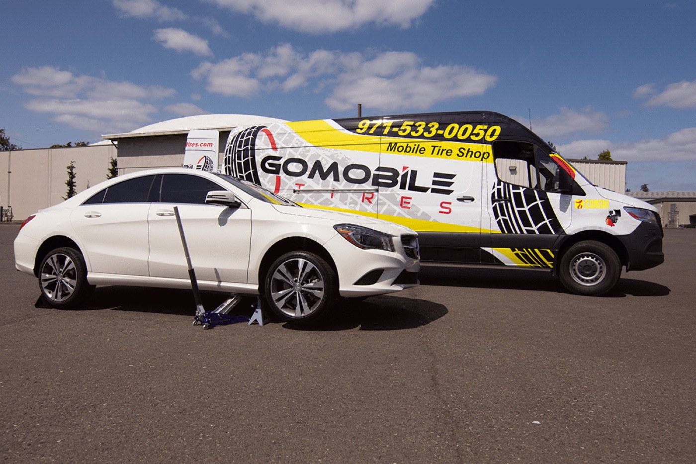 GoMobile Tires van servicing a car